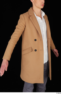 Johnny Reed brown coat business dressed upper body 0008.jpg